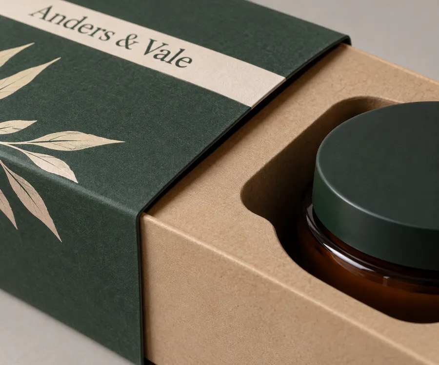 Close-up of a die-cut tray sliding into a printed sleeve box