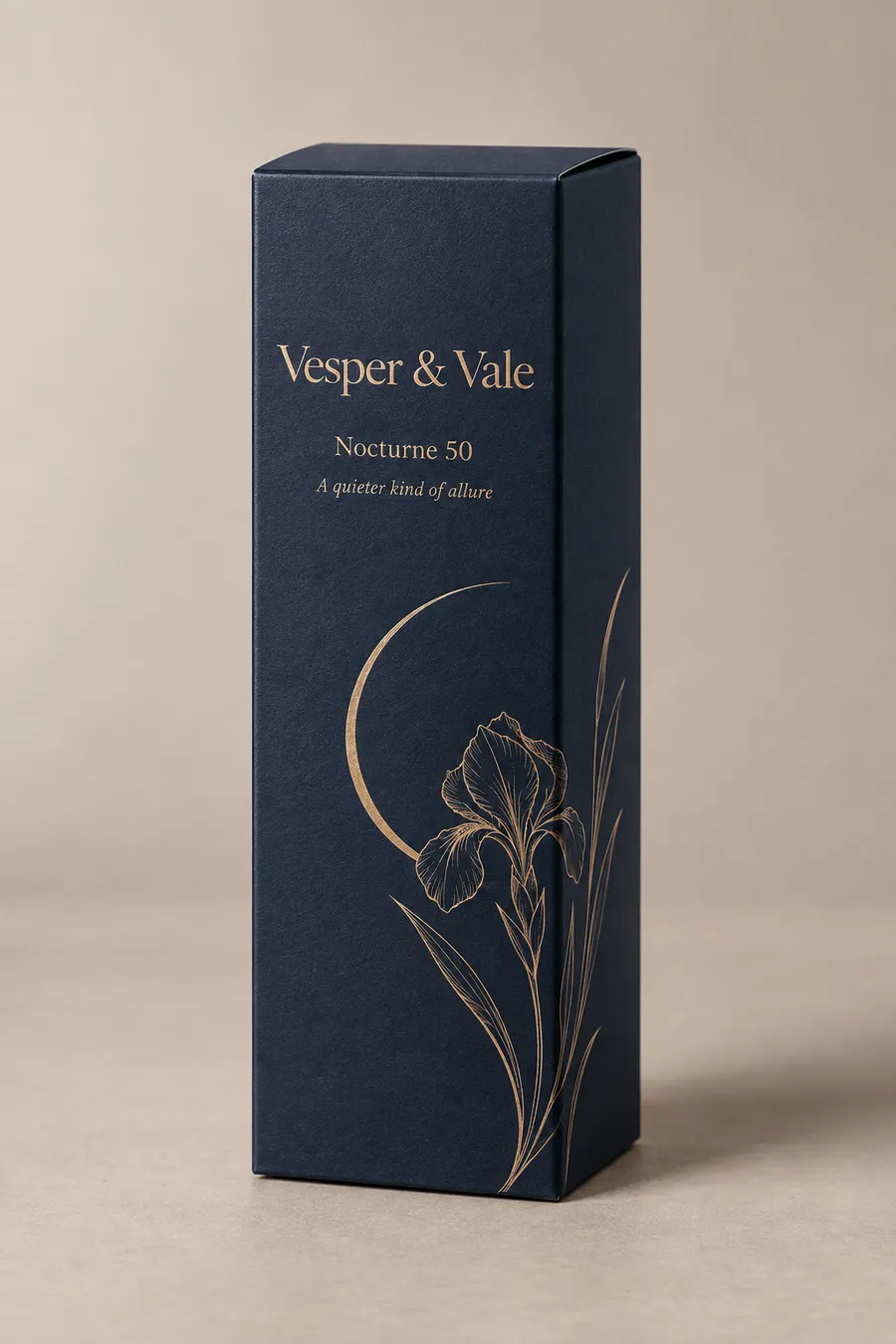 Closed midnight-blue custom perfume carton with champagne foil Vesper & Vale print