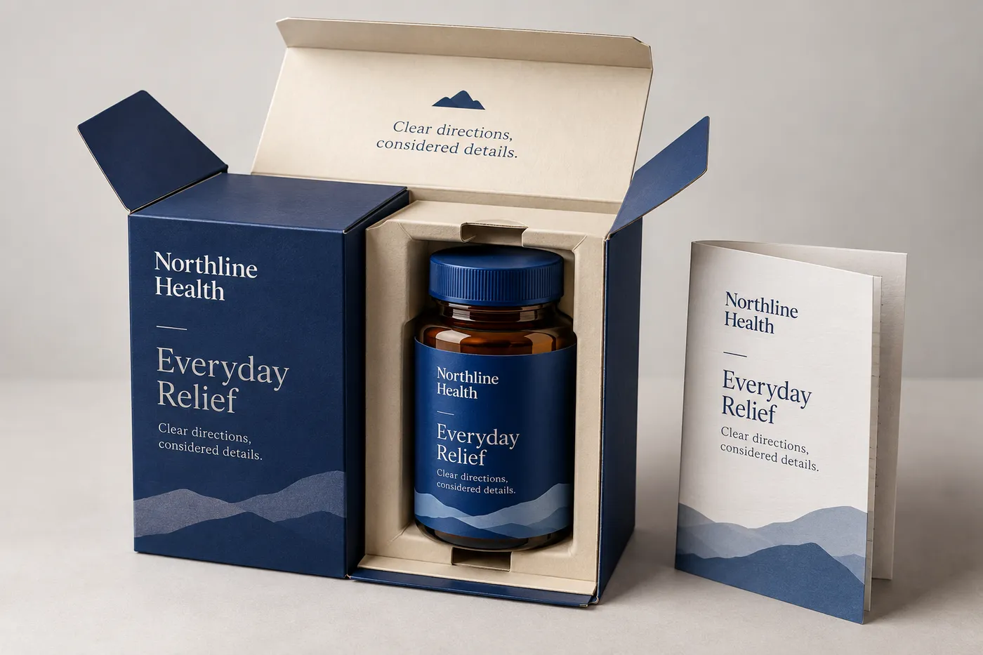 Open cobalt OTC medication carton with an amber bottle and instruction leaflet.