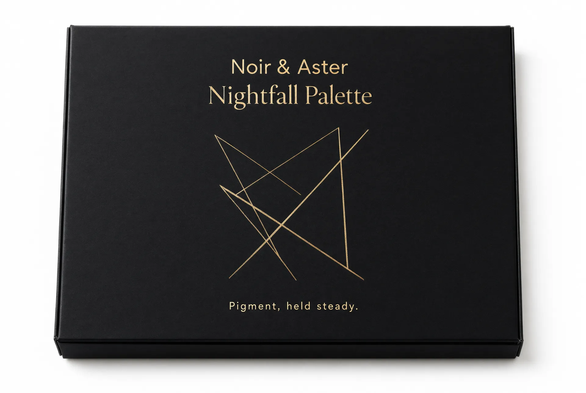 Closed flat black eyeshadow palette box with a gold geometric line motif on the lid
