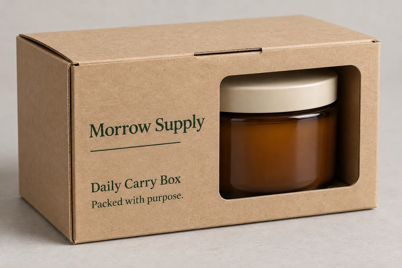 Close detail of product carton window, tuck-top fold, and candle jar